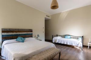 Voodi või voodid majutusasutuse Borgo D'Itria toas