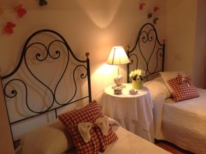 Postel nebo postele na pokoji v ubytování B&B Michelangeli - Private parking