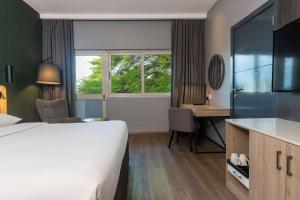 Voodi või voodid majutusasutuse Park Inn by Radisson, Lagos Victoria Island toas