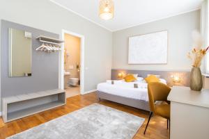 Postel nebo postele na pokoji v ubytování Martini Suite
