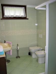 Koupelna v ubytování Appartamento Vacanze da Jolanda