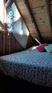 Ένα ή περισσότερα κρεβάτια σε δωμάτιο στο Los Cardones Tiny House