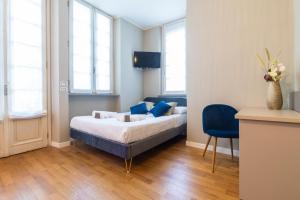 Postel nebo postele na pokoji v ubytování Martini Suite