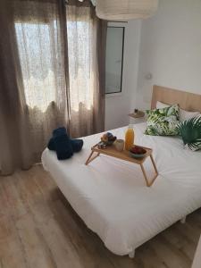 Postel nebo postele na pokoji v ubytování Aptos dOr + 6 fotografií