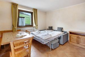 Ένα ή περισσότερα κρεβάτια σε δωμάτιο στο Chalet Anna Rododendro