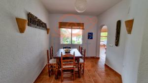 a dining room with a table and chairs at CASA BACANA. MORAIRA- LIVE IT COSTABLANCA in Moraira