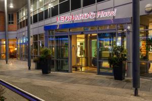 a building with a sign on the side of it at Leonardo Hotel Liverpool in Liverpool