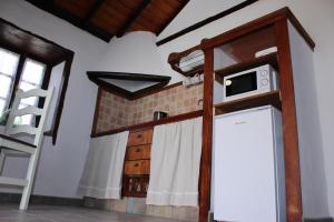 Kuchnia lub aneks kuchenny w obiekcie Casitas La Montañita