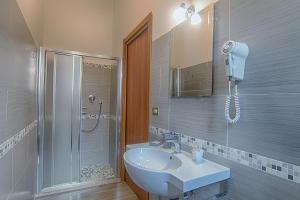 Koupelna v ubytování Hotel Raimondi