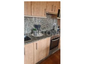 Kuchnia lub aneks kuchenny w obiekcie Apartamento Vacacional A Lanzada