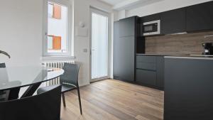Kuchyň nebo kuchyňský kout v ubytování Hotel Corte Santa Libera