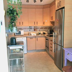 Kuchyňa alebo kuchynka v ubytovaní One bedroom penthouse