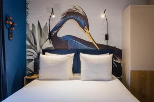 Postel nebo postele na pokoji v ubytování Hotel St Joris I Kloeg Collection