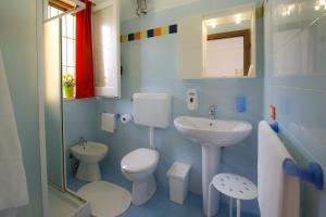 Koupelna v ubytování B&B Fiori Gialli Caucana