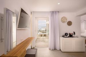 Фотография из галереи Kantouni Beach Boutique Hotel в городе Панормос-Калимнос