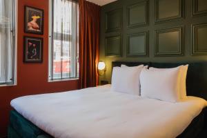 Postel nebo postele na pokoji v ubytování Hotel St Joris I Kloeg Collection