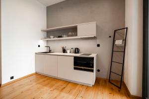 Kuchyňa alebo kuchynka v ubytovaní Piano apartments - LICITY