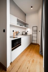 Kuchyňa alebo kuchynka v ubytovaní Piano apartments - LICITY