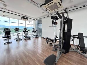 a gym with a bunch of exercise equipment in a room at Semenyih kajang kiara plaza kids Land in Kajang