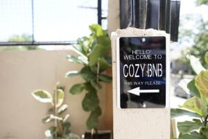 Certifikát, hodnocení, plakát nebo jiný dokument vystavený v ubytování Cozy BNB - Unit L