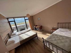 A bed or beds in a room at Old district
