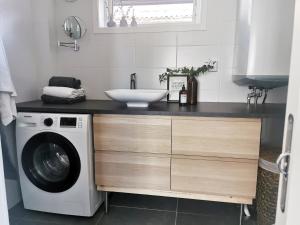 A bathroom at Holiday home on Resaro only 400 m from the sea