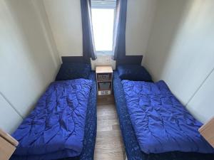 Postel nebo postele na pokoji v ubytování NV 1162 - Beach Resort Nieuwvliet Bad