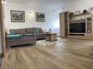 Χώρος καθιστικού στο Apartma Kemper