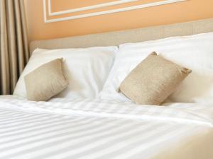 Postel nebo postele na pokoji v ubytování NK hostel