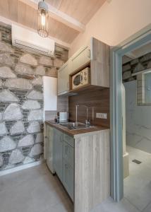 Cucina o angolo cottura di Thea Sunset Suites