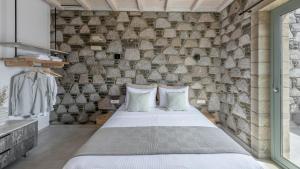 Letto o letti in una camera di Thea Sunset Suites