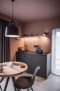 Kuchyň nebo kuchyňský kout v ubytování Rousa little guesthouse Cosy Plus