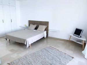 Postel nebo postele na pokoji v ubytování Appartement en bord de mer