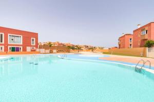 Bazén v ubytování Las Dunas Corralejo Home with swimming pool nebo v jeho okolí