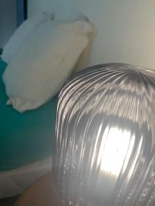 a close up of a clear plastic object in a room at le moringa Appart vue mer 360 Mamoudzou hyper centre in Mamoudzou