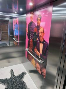 a display case with a picture of a man and a star at HOLA GDYNIA in Gdynia