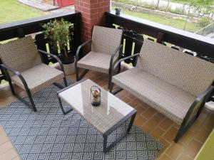 A seating area at Apartment Wigo