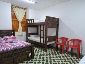 Postel nebo postele na pokoji v ubytování Hostal Casa Lara + 46 fotografií