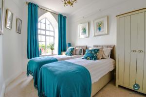 Voodi või voodid majutusasutuse The Old Chapel - Exclusive Retreat toas