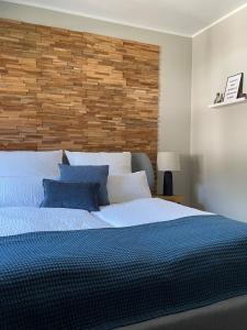 Postel nebo postele na pokoji v ubytování Das Bergquartier - Ferienwohnung Rabenkopf