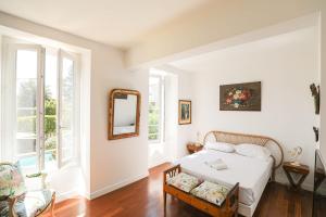Posteľ alebo postele v izbe v ubytovaní Bastide les Oréades - Villa de luxe