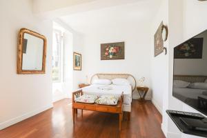 Posteľ alebo postele v izbe v ubytovaní Bastide les Oréades - Villa de luxe