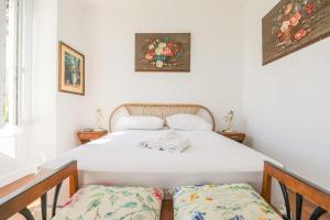 Posteľ alebo postele v izbe v ubytovaní Bastide les Oréades - Villa de luxe