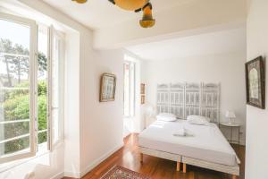 Posteľ alebo postele v izbe v ubytovaní Bastide les Oréades - Villa de luxe
