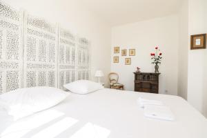 Posteľ alebo postele v izbe v ubytovaní Bastide les Oréades - Villa de luxe