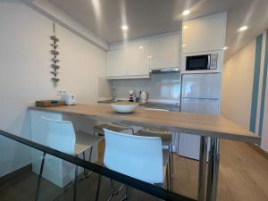 Kuchyň nebo kuchyňský kout v ubytování Stylish New designed apartment with terrace