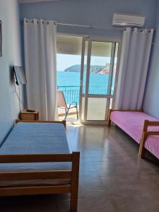 Postel nebo postele na pokoji v ubytování Apartmani Orange Dreams