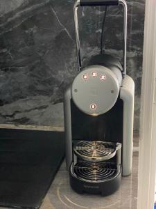a toaster is sitting on a kitchen counter at Veranta Vosporos in Poros