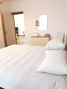 En eller flere senge i et værelse på Casa Giulia La Spezia