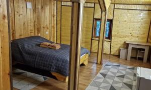 Postel nebo postele na pokoji v ubytování Kolyba Complex